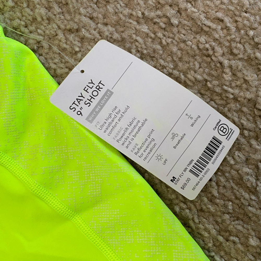 NWT Athleta Stay Fly 9" Short Compression Reflective Running | Young Banana M - Picture 5 of 6